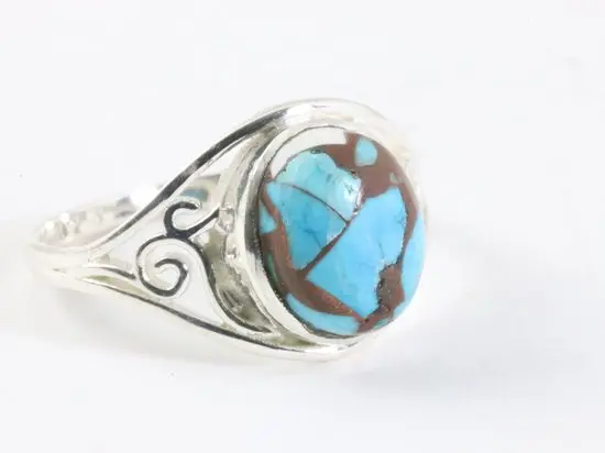 Opengewerkte zilveren ring met blauwe turkoois