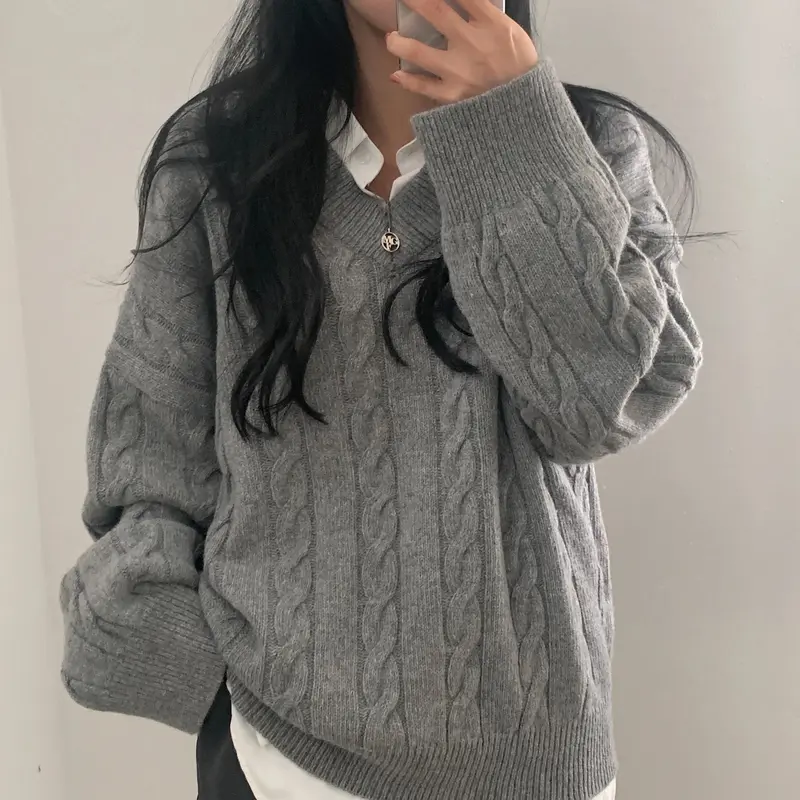 Oversized trui met V-hals en kabelpatroon