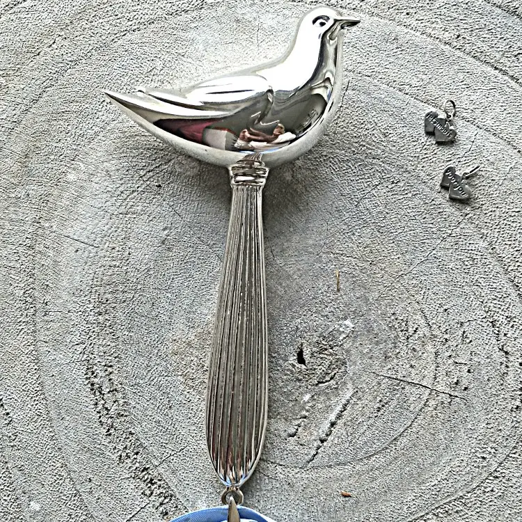 Rammelaar duif zilver