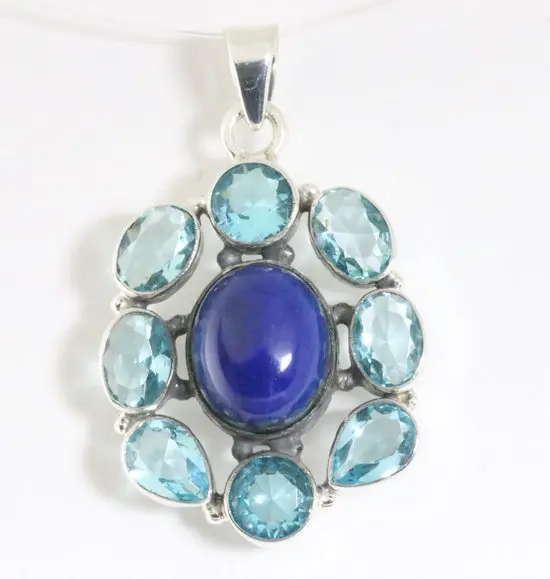 Zilveren hanger met lapis lazuli en blauwe topaas