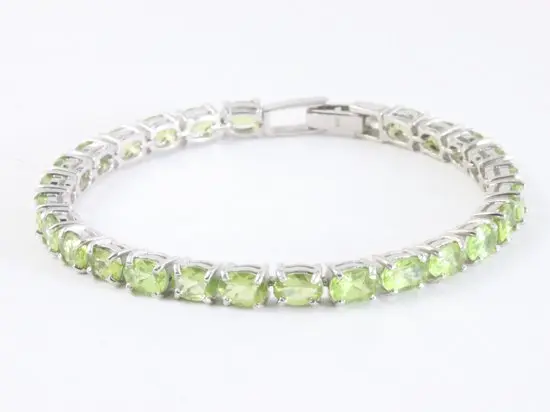Zilveren tennisarmband met peridoot