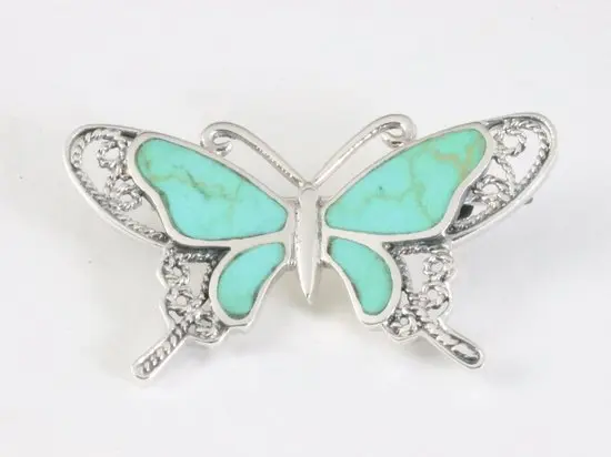 Zilveren vlinder broche met groene turkoois