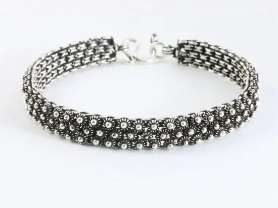 Zware fijn bewerkte gevlochten zilveren armband